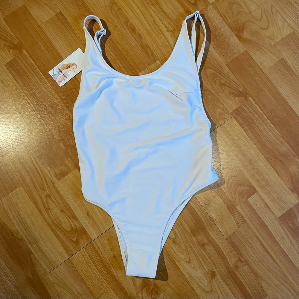 White one piece swimsuit with scoop back
